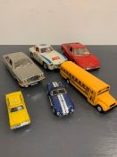 A selection of six Diecast vehicle of various makers, ERTL, Kinsmart and Burago