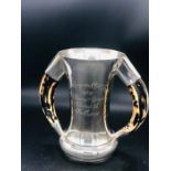 HORSE RACING INTEREST: A Hallmarked silver trophy with horn handles engraved The Racegoers Club