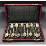 A Boxed set of Twelve Continental silver teaspoons, marked 800