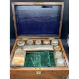 A Ladies Travel Box with original glass jars etc.