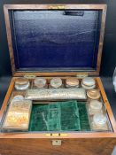 A Ladies Travel Box with original glass jars etc.