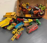 A selection of Diecast vehicles to tractors, dumper trucks, etc