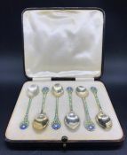A Boxed set of six silver and enamel teaspoons, Birmingham hallmark 1935