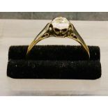 A Diamond Ring on an 18 ct gold and platinum setting