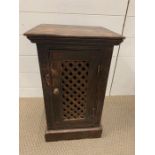 A small side cabinet with lattice door (H58cm W34cm D30cm)