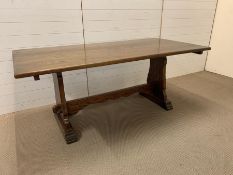 Solid oak dining table with carved straighter to base (H75cm W183cm D90cm)