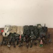 A selection of Diecast army vehicles and figures