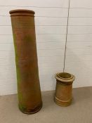 Two Victorian terracotta chimney pots