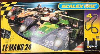 Boxed scalextric Le Mans 24, including track and cars