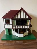 Wooden painted dolls house (H60cm W70cm D48cm)