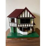 Wooden painted dolls house (H60cm W70cm D48cm)