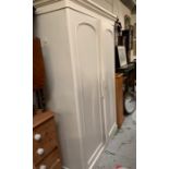Large pine wardrobe with painted white doors
