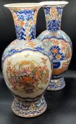Pair of porcelain oriental vases decorated with florals scenes 48cm H