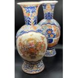 Pair of porcelain oriental vases decorated with florals scenes 48cm H