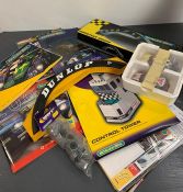 Scalextric accessories including Goodyear bridge, Dunlop bridge and magazines and two cars