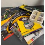 Scalextric accessories including Goodyear bridge, Dunlop bridge and magazines and two cars