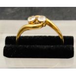 A Two Stone Diamond Ring in an 18 ct gold setting