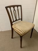 A Single slat back Dining Chair.