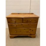 Pine chest of drawers with two short and two long drawers (H73cm W86cm D44cm)