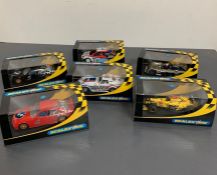 Six Scalextric boxed cars