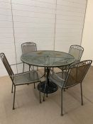 Metal garden table and chairs with cast iron umbrella stand