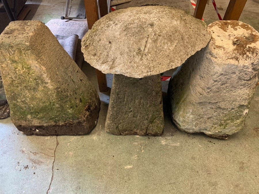 Three staddle stones bases and one top.