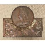 An 1887 Queen Victoria wall plaque, commemorating her Golden Jubilee (59 cm H x 74 cm W)