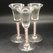 Three Georgian Coloured Air Twist Cordial Glasses.