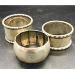 A selection of three silver napkin rings, all hallmarked.
