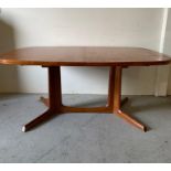 A large extending Danish dining table by Niels Moller of Gudme Mobel Fabrik Denmark