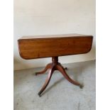 A Regency Pembroke table on four down swept legs and brass claw feet (90cm x 86cm x 68cm)