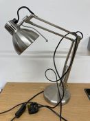 A metal adjustable table lamp