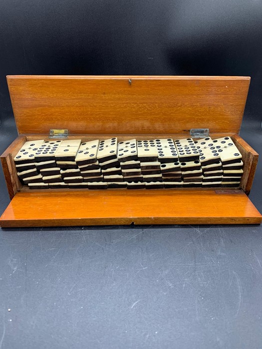 A set of Antique ivory and ebony-backed dominoes - Image 3 of 3