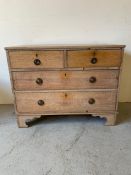 A Limed oak two over two chest of drawers on bracket feet (H77cm W98cm D48cm)