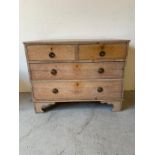 A Limed oak two over two chest of drawers on bracket feet (H77cm W98cm D48cm)