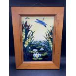 Moorcroft wall plaque in a pine frame