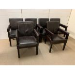 Six faux leather matching dining armchairs with brown faux leather by Andrew Martin London.