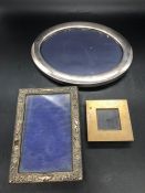 Two hallmarked Silver photos frames and one silver plated frame
