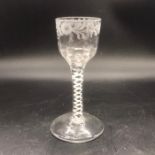 A Georgian Air Twist Glass with etched design.
