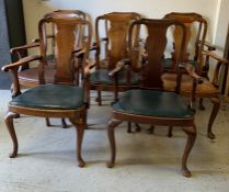 Queen Anne style walnut open armchairs with splat back, scrolled arms and cabriole legs