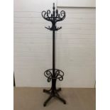 A coat stand with eight coat hooks (H225cm)