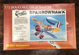 Two boxed aircraft model kits to include, Williams Bros Sparrowhawk and Heller Humbrol Douglas C-118