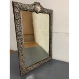 A Bevel Edged silver framed mirror in a rococo style, hallmarked Birmingham, makers mark HM
