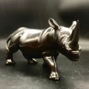 An Ebonised Rhino