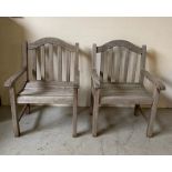 A pair of wooden garden chairs (H94cm W64cm D63cm)