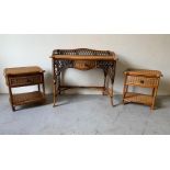 A cane suite comprising of a dressing table with chair and two side tables