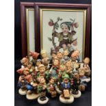 A Collection of Twenty Two Hummel or Goebel figures, with cards and two needlework pictures of two