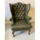 Faux leather button green wingback chair