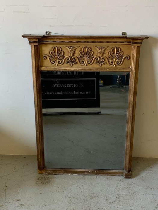 Regency giltwood mirror with floral and scrolling leaves to top with moulded sides and beads (94
