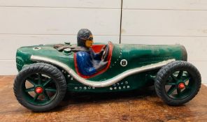 Large model of vintage racing car and driver